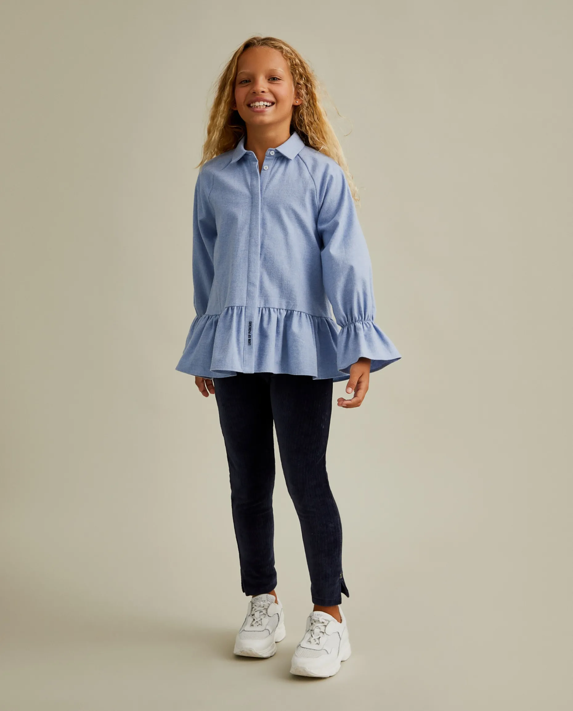 Blusa de manga comprida com folhos