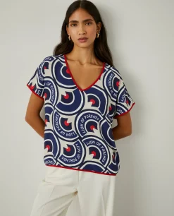 Blusa decote em V com padrão geométrico