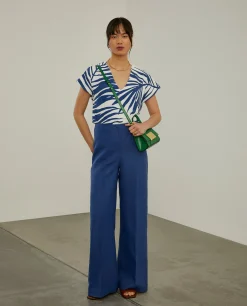 Blusa fluida com padrão palmeiras