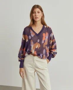 Blusa fluida estampada semi-transparente