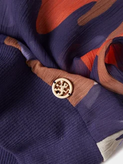 Blusa fluida estampada semi-transparente