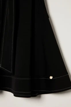 Blusa sem mangas com gola alta