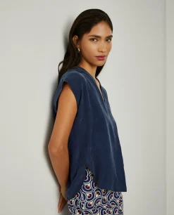 Blusa sem mangas em cupro