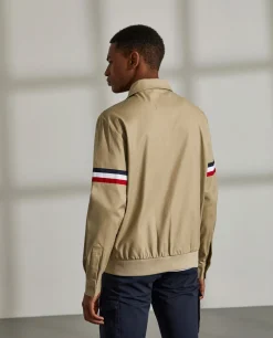 Blusão de algodão com pormenor de riscas e bolso no peito