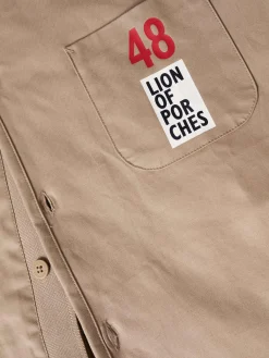 Blusão de algodão com pormenor de riscas e bolso no peito