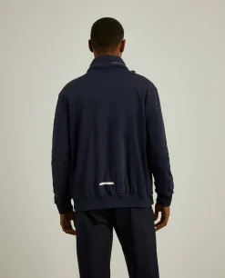 Blusão em tecido técnico com capuz embutido