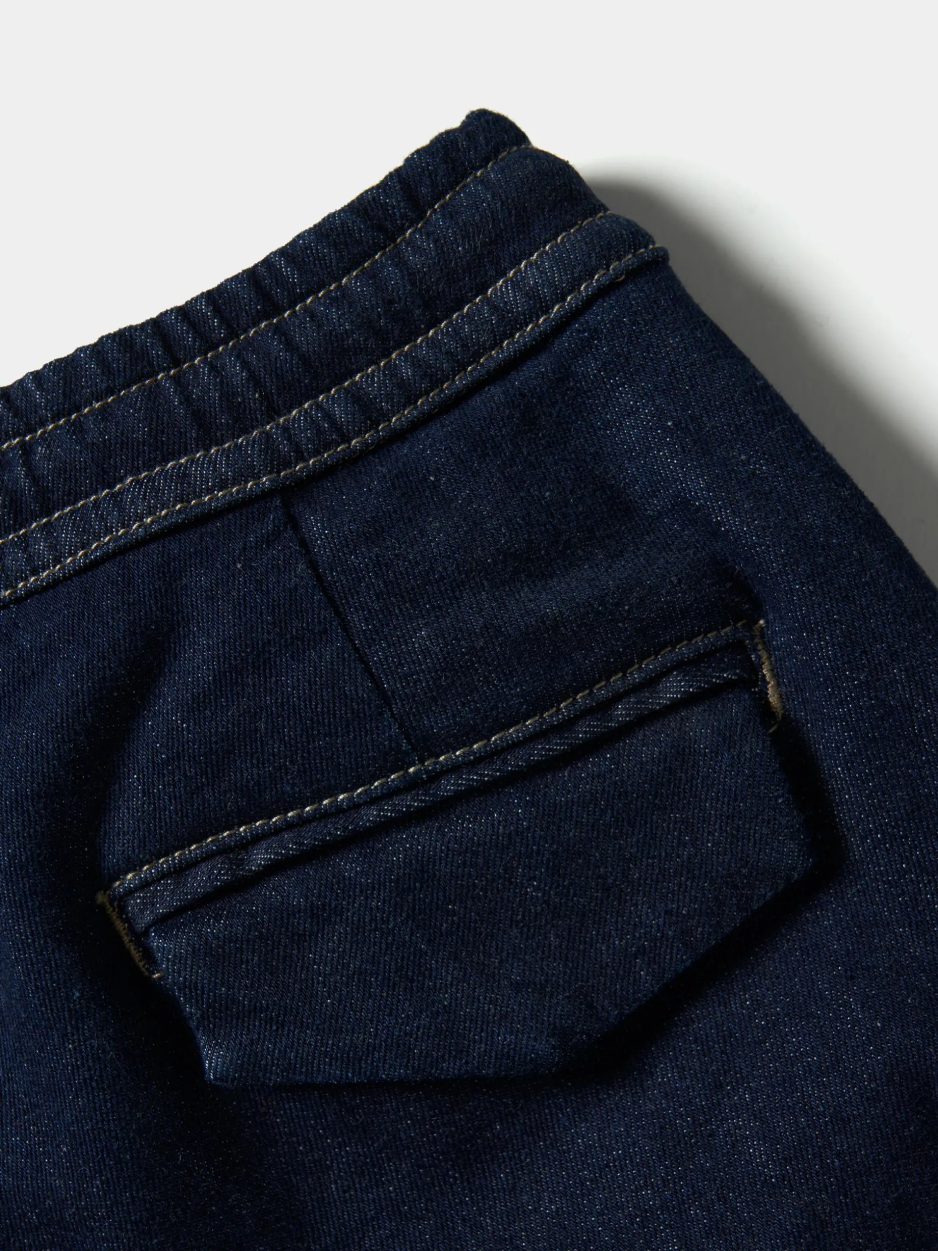 Calças chino de ganga