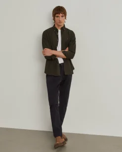 Calças chino regular fit com pregas