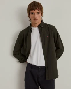 Calças chino regular fit com pregas