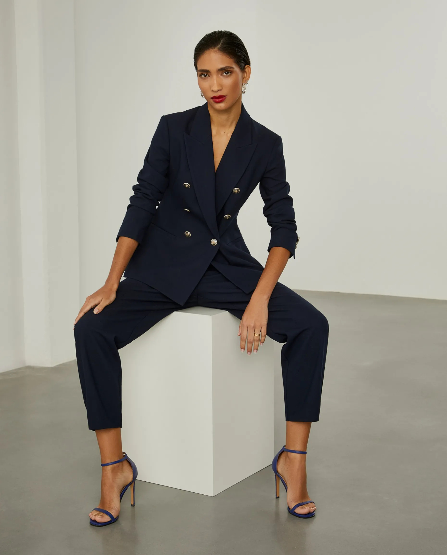 Calças clássicas com prega