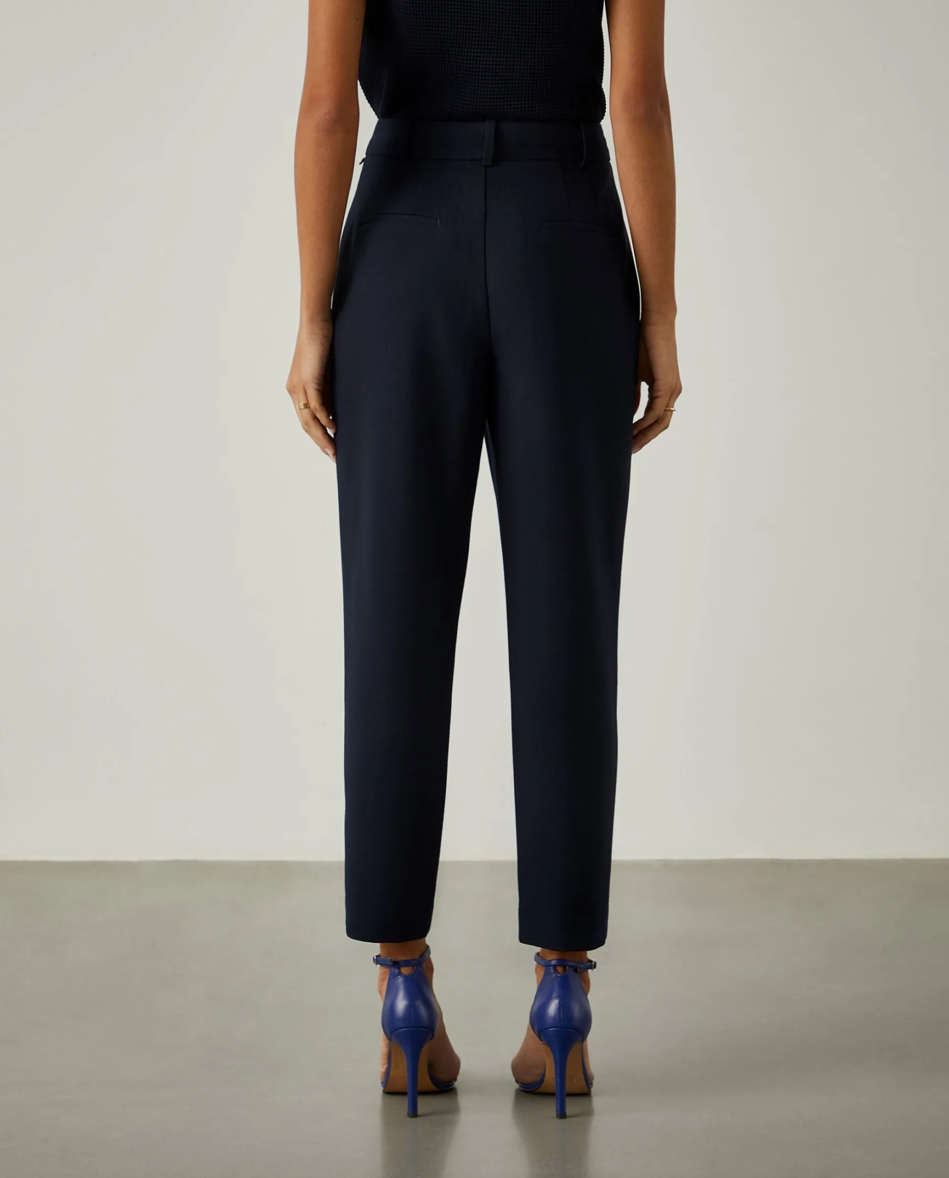 Calças clássicas com prega