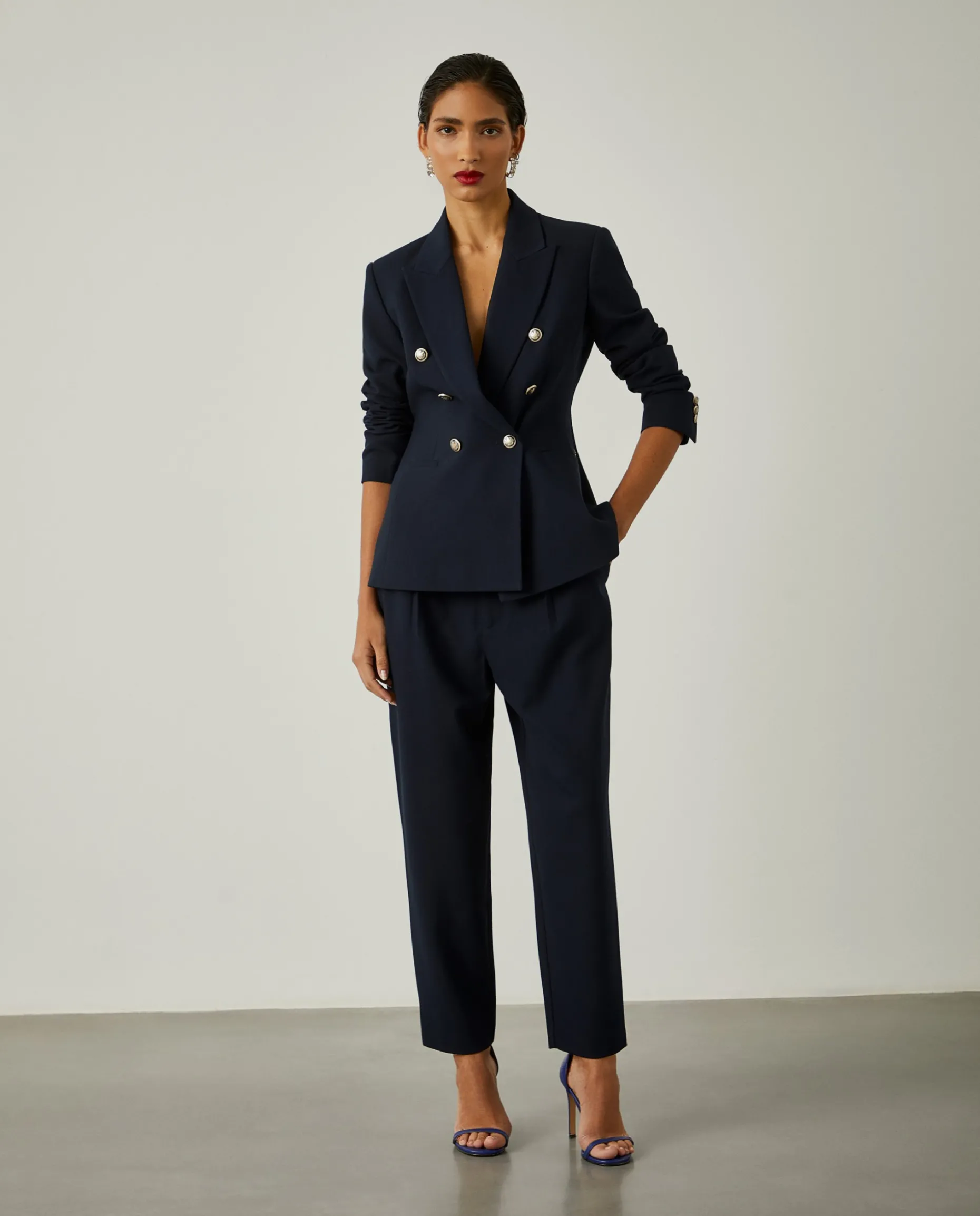 Calças clássicas com prega