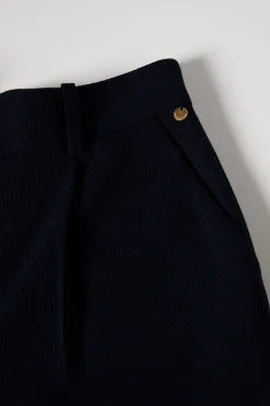 Calças clássicas com prega