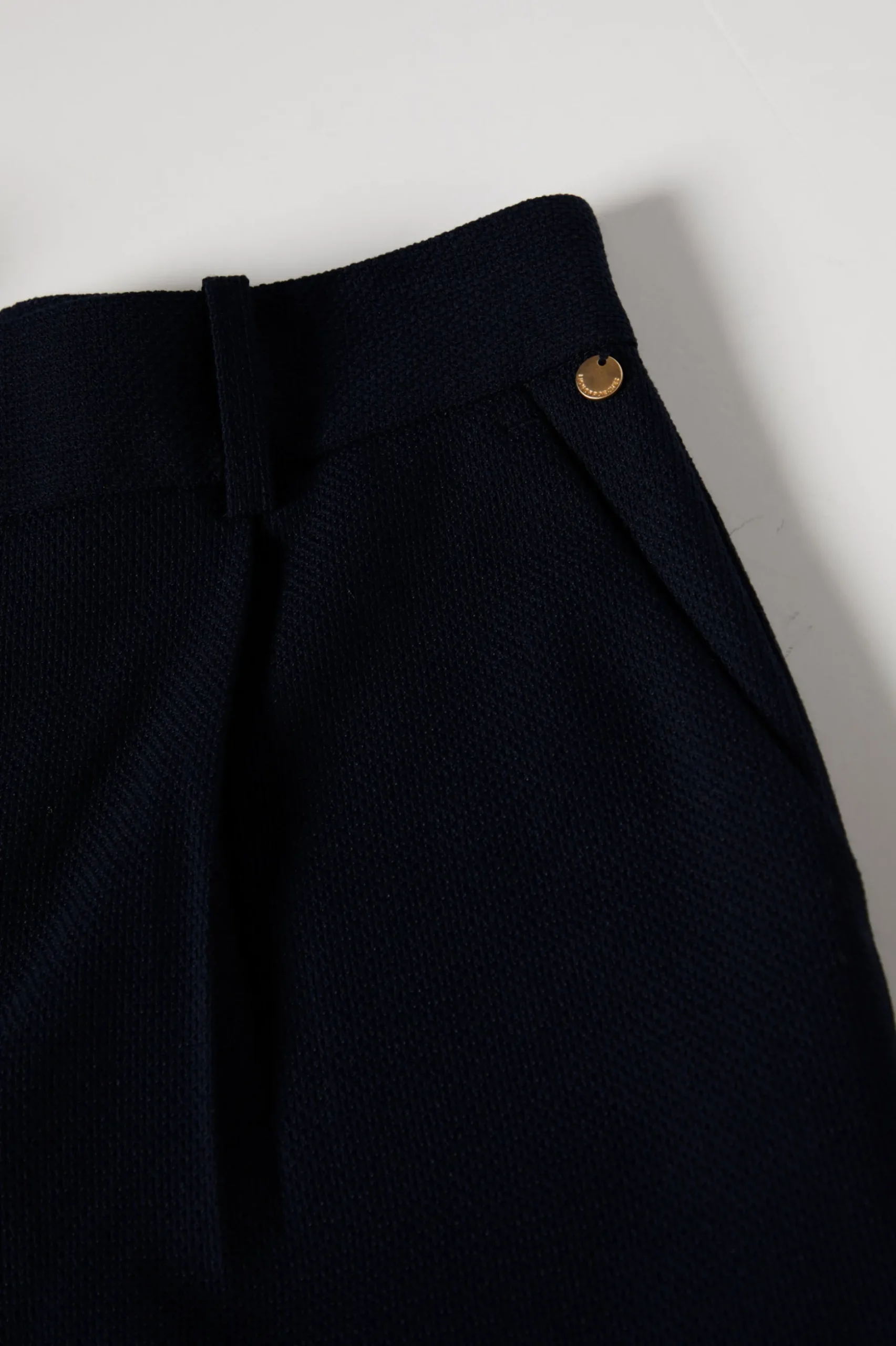 Calças clássicas com prega