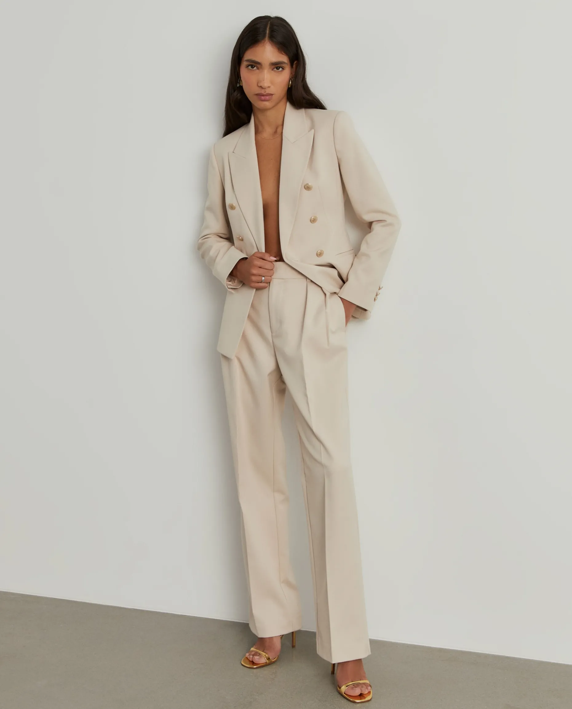 Calças clássicas com pregas