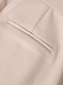 Calças clássicas com pregas