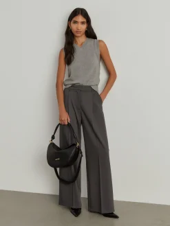 Calças clássicas largas com pregas