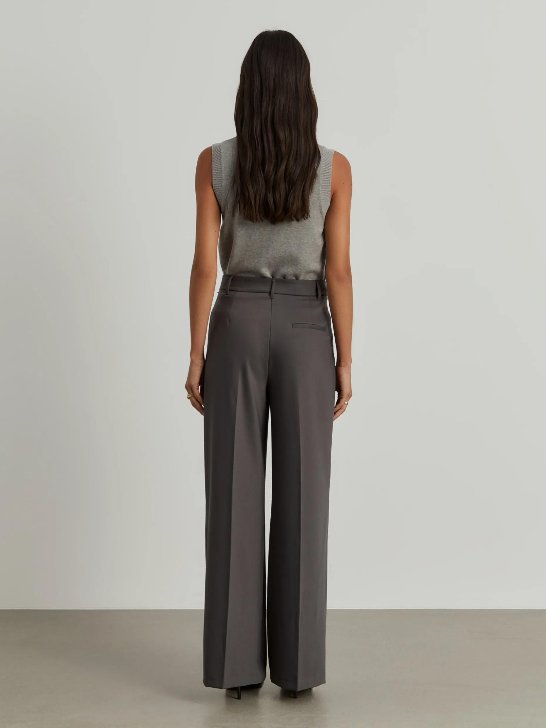 Calças clássicas largas com pregas