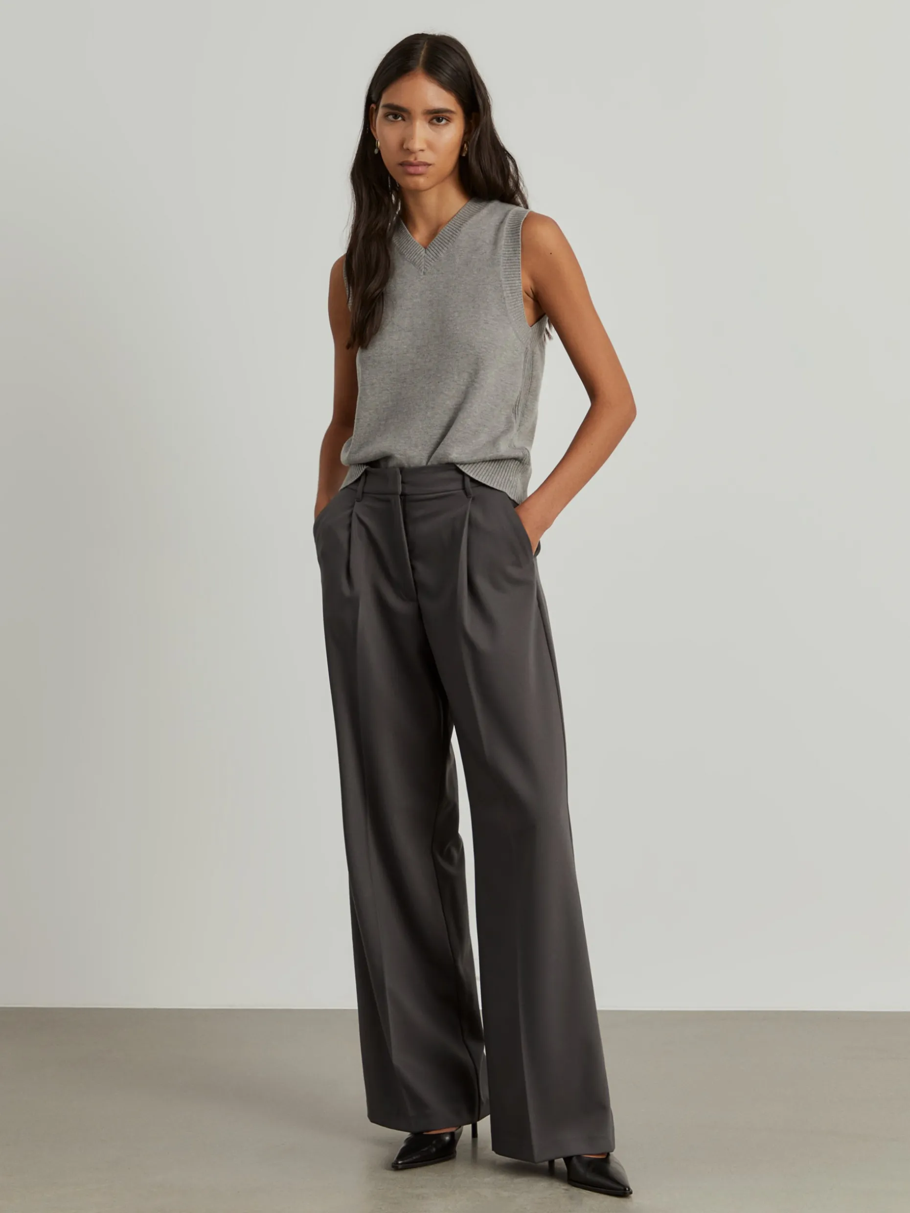 Calças clássicas largas com pregas