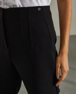 Calças de cintura subida