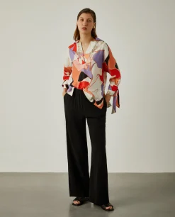 Calças de corte direito com cintura elástica