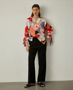 Calças de corte direito com cintura elástica