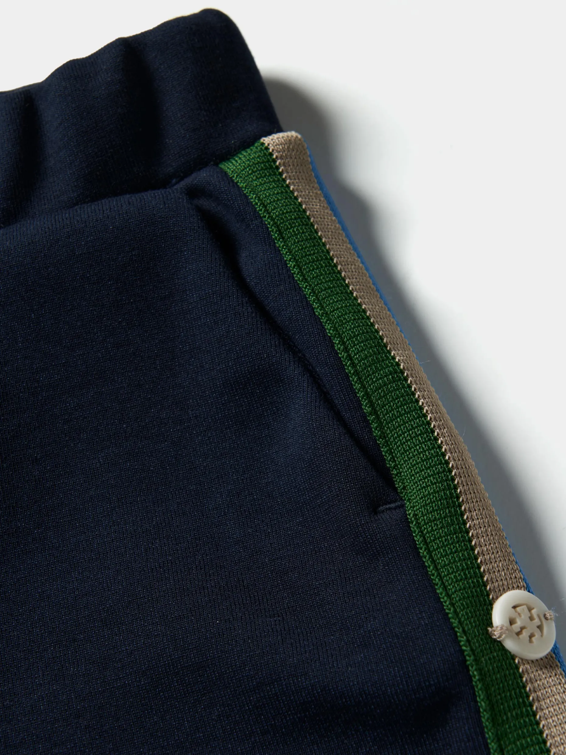 Calças de malha com riscas laterais