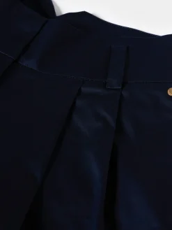 Calças de perna larga com pregas na frente