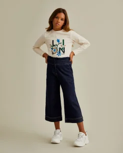 Calças denim com folho