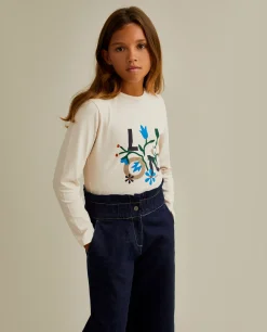 Calças denim com folho