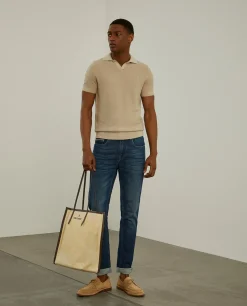 Calças denim lavagem escura slim fit