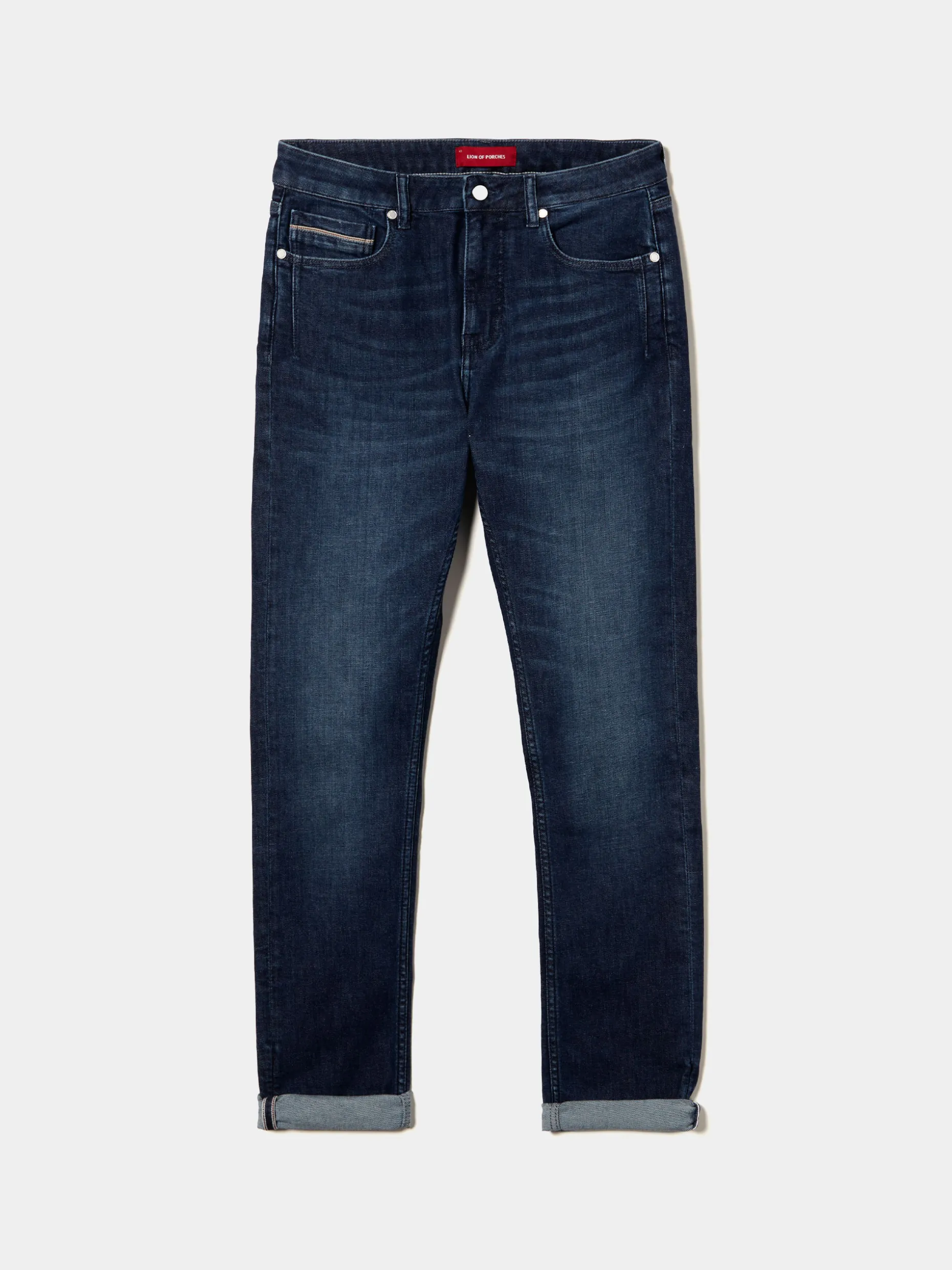 Calças denim lavagem escura slim fit