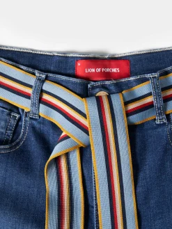 Calças denim regular fit com cinto