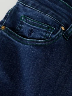 Calças denim regular fit de lavagem escura