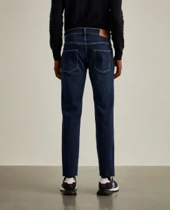 Calças denim regular fit lavagem escura