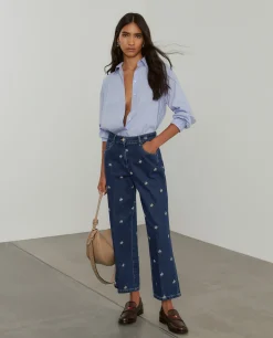 Calças denim wide leg com bordados