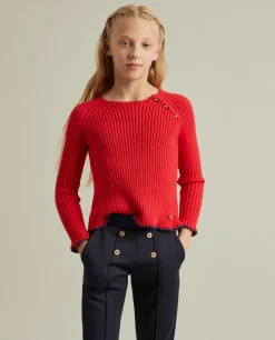 Calças em malha com botões e vincos