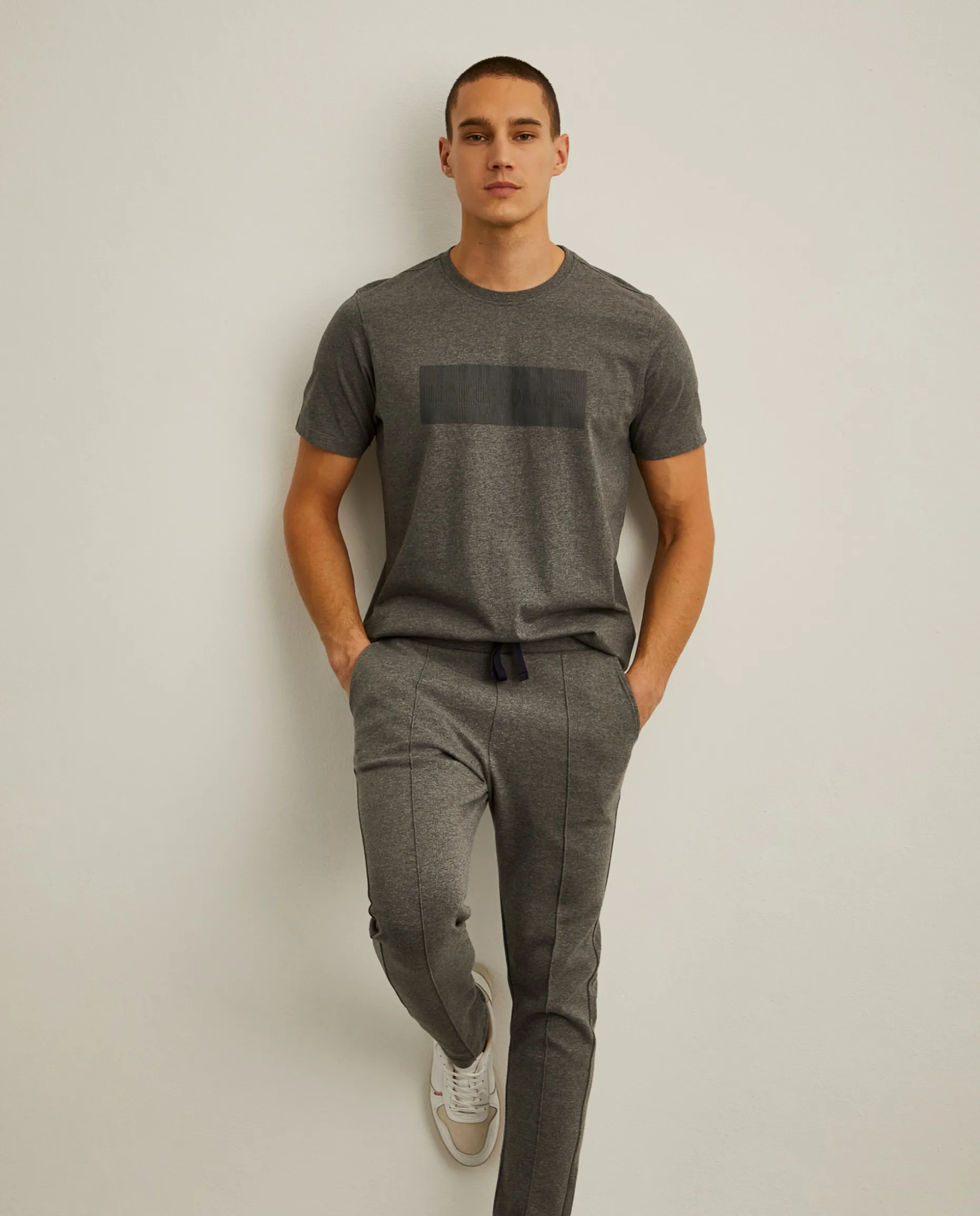 Calças em malha com cordão