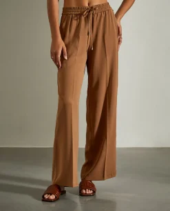 Calças fluidas de perna larga com cordão