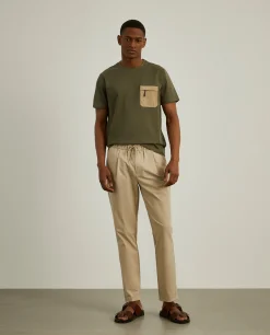 Calças jogger em malha técnica com cordão