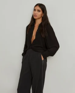 Calças largas com cintura elástica