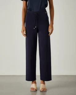 Calças largas de malha