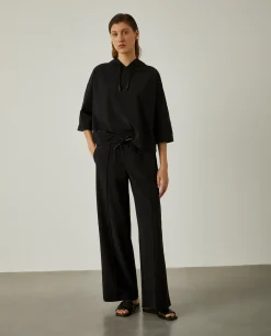 Calças pantalona em malha cintura ajustável