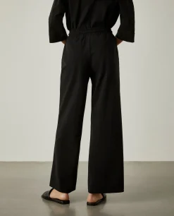 Calças pantalona em malha cintura ajustável