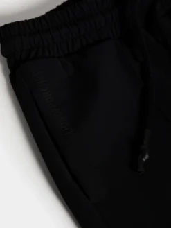 Calças pantalona em malha cintura ajustável