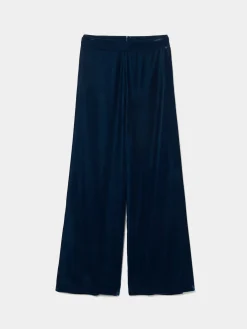 Calças pantalona em veludo