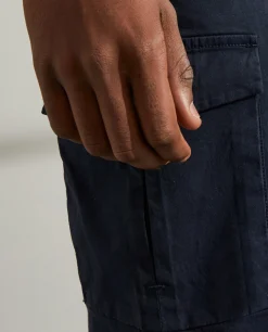 Calças regular fit chino de algodão stretch