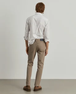 Calças regular fit com cinco bolsos