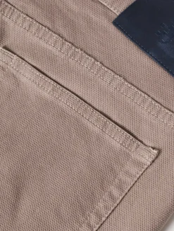 Calças regular fit com cinco bolsos