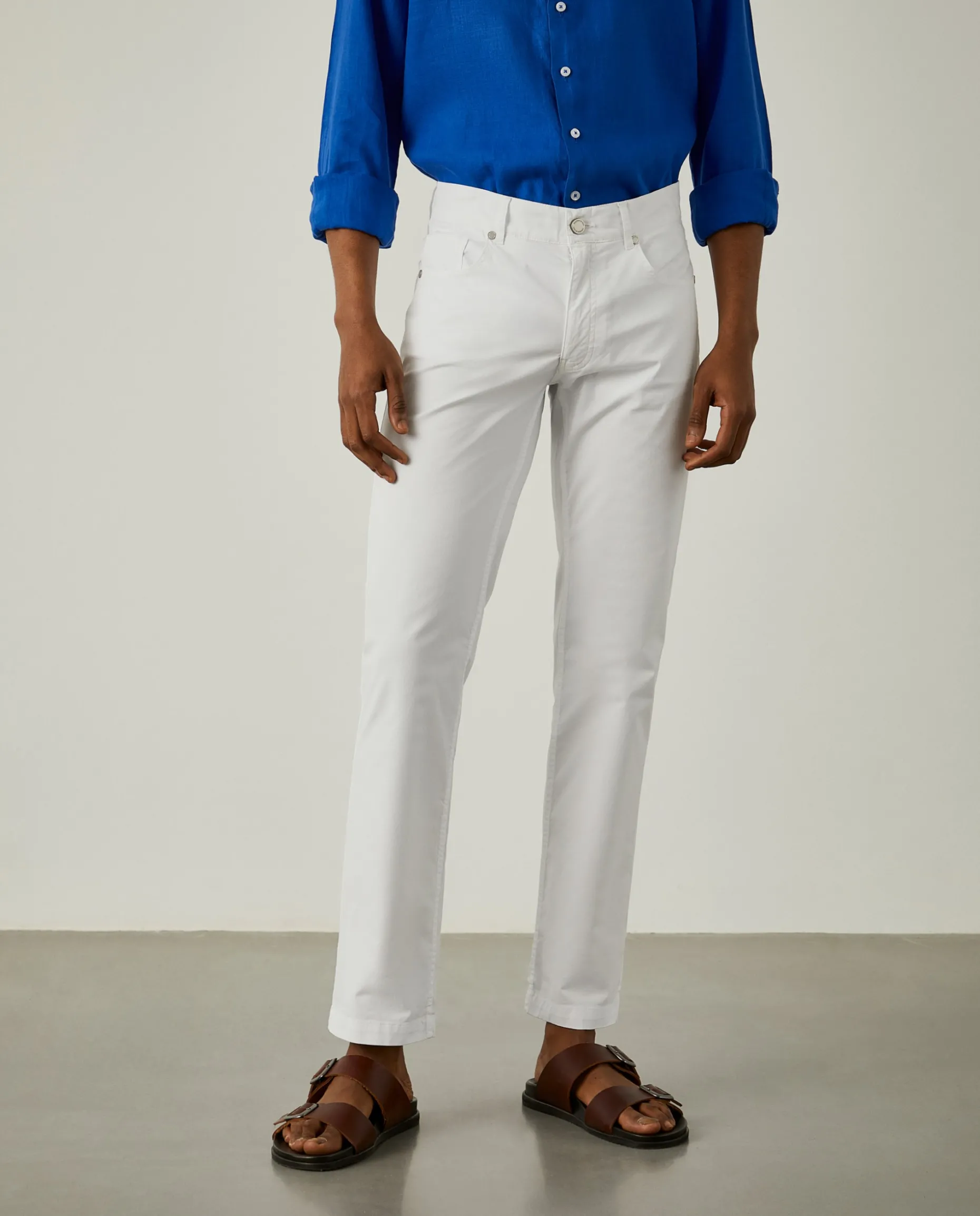 Calças regular fit com cinco bolsos